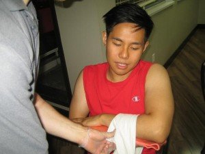 Splinting an injured arm (first aid)